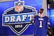 NEW YORK, NY - APRIL 25: E.J. Manuel of the Florida State Seminoles holds up a jersey on stage after he was picked #16 overall by the Buffalo Bills in the first round of the 2013 NFL Draft at Radio City Music Hall on April 25, 2013 in New York City. (Photo by Al Bello/Getty Images)