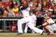 CINCINNATI, OH - APRIL 16: Brandon Phillips #4 of the Cincinnati Reds swings at a pitch during the game against the Philadelphia Phillies at Great American Ball Park on April 16, 2013 in Cincinnati, Ohio. (Photo by Andy Lyons/Getty Images)