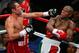 LAS VEGAS - MAY 05: Floyd Mayweather Jr. (R) slips a punch from Oscar De La Hoya in the eighth round of their WBC super welterweight championship fight at the MGM Grand Garden Arena May 5, 2007 in Las Vegas, Nevada. Mayweather defeated De La Hoya by split decision. (Photo by Ethan Miller/Getty Images)