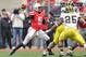 COLUMBUS, OH - NOVEMBER 24: Quarterback Braxton Miller #5 of the Ohio State Buckeyes controls the ball against the Michigan Wolverines at Ohio Stadium on November 24, 2012 in Columbus, Ohio. (Photo by Jamie Sabau/Getty Images)