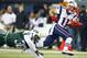EAST RUTHERFORD, NJ - NOVEMBER 22: Wide receiver Julian Edelman #11 of the New England Patriots makes a catch for a touchdown as LaRon Landry #30 defends during the second quarter of a game at MetLife Stadium on November 22, 2012 in East Rutherford, New Jersey. (Photo by Rich Schultz /Getty Images)