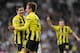 MADRID, SPAIN - NOVEMBER 06: Mario Gotze (2nd L) of Borussia Dortmund celebrates with team-mate Robert Lewandowski after scoring their team's second goal during the UEFA Champions League Group D match between Real Madrid and Borussia Dortmund at Estadio Santiago Bernabeu on November 6, 2012 in Madrid, Spain. (Photo by Denis Doyle/Getty Images)