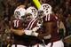 COLLEGE STATION, TX - NOVEMBER 24: Johnny Manziel #2 of the Texas A&M Aggies (C) celebrates a third quarter touchdown with teammates during their game against the Missouri Tigers at Kyle Field on November 24, 2012 in College Station, Texas. (Photo by Scott Halleran/Getty Images)