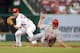 ST. LOUIS, MO - APRIL 30: Daniel Descalso #33 of the St. Louis Cardinals tries to turn a double play as Jay Bruce #32 of the Cincinnati Reds slides during the second inning at Busch Stadium on April 30, 2013 in St. Louis, Missouri. (Photo by Jeff Curry/Getty Images)