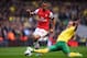 LONDON, ENGLAND - APRIL 13: Steven Whittaker of Norwich City and Theo Walcott of Arsenal compete for the ball during the Barclays Premier League match between Arsenal and Norwich City at Emirates Stadium on April 13, 2013 in London, England. (Photo by Mike Hewitt/Getty Images)
