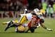 SAN FRANCISCO, CA - JANUARY 12: Wide receiver Michael Crabtree #15 of the San Francisco 49ers runs the ball against strong safety Morgan Burnett #42 of the Green Bay Packers during the NFC Divisional Playoff Game at Candlestick Park on January 12, 2013 in San Francisco, California. (Photo by Thearon W. Henderson/Getty Images)