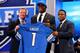 NEW YORK, NY - APRIL 25: Ezekiel Ansah of the BYU Cougars stands with NFL Commissioner Roger Goodell (L) and Pro Football Hall of Famer Barry Sanders (R) as they hold up a jersey on stage after Ansah was picked #5 overall by the Detroit Lions in the first round of the 2013 NFL Draft at Radio City Music Hall on April 25, 2013 in New York City. (Photo by Al Bello/Getty Images)
