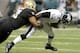 November 5, 2012; New Orleans, LA, USA; New Orleans Saints defensive end Will Smith (91) sacks Philadelphia Eagles quarterback Michael Vick (7) for a loss during third quarter of their game at the Mercedes-Benz Superdome. Mandatory Credit: John David Mercer-USA TODAY Sports