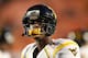 MIAMI GARDENS, FL - JANUARY 04: Geno Smith #12 of the West Virginia Mountaineers looks on during warm ups against the Clemson Tigers during the Discover Orange Bowl at Sun Life Stadium on January 4, 2012 in Miami Gardens, Florida. (Photo by J. Meric/Getty Images)