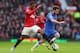 MANCHESTER, ENGLAND - MARCH 10: Juan Mata of Chelsea competes with Patrice Evra of Manchester United during the FA Cup sponsored by Budweiser Sixth Round match between Manchester United and Chelsea at Old Trafford on March 10, 2013 in Manchester, England. (Photo by Alex Livesey/Getty Images)