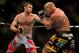 Jul. 7, 2012; Las Vegas, NV, USA; UFC fighter Forrest Griffin (left) against Tito Ortiz during a light heavyweight bout in UFC 148 at the MGM Grand Garden Arena. Mandatory Credit: Mark J. Rebilas-USA TODAY Sports