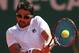 MONTE-CARLO, MONACO - APRIL 16: Janko Tipsarevic of Serbia plays a backhand against Grigor Dimitrov of Bulgaria in their second round match during day three of the ATP Monte Carlo Masters,at Monte-Carlo Sporting Club on April 16, 2013 in Monte-Carlo, Monaco. (Photo by Clive Brunskill/Getty Images)