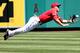 ANAHEIM, CA - APRIL 21: Left fielder Mike Trout #27 of the Los Angeles Angels of Anaheim dives to catch a line drive hit by Brayan Pena of the Detroit Tigers in the second inning at Angel Stadium of Anaheim on April 21, 2013 in Anaheim, California. (Photo by Stephen Dunn/Getty Images)