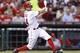 CINCINNATI, OH - APRIL 17: Mike Leake #44 of the Cincinnati Reds triples to drive in a run in the second inning of the game against the Philadelphia Phillies at Great American Ball Park on April 17, 2013 in Cincinnati, Ohio. (Photo by Joe Robbins/Getty Images)
