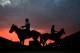 LOUISVILLE, KY - MAY 03: Horses walk in the stable as the sun rises during morning workouts for the 2013 Kentucky Derby at Churchill Downs on May 3, 2013 in Louisville, Kentucky. (Photo by Jamie Squire/Getty Images)