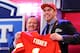 NEW YORK, NY - APRIL 25: Eric Fisher (R) of Central Michigan Chippewas stands on stage with NFL Commissioner Roger Goodell after Fisher was picked #1 overall by the Kansas City Chiefs in the first round of the 2013 NFL Draft at Radio City Music Hall on April 25, 2013 in New York City. (Photo by Al Bello/Getty Images)