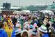 LOUISVILLE, KY - MAY 04: Fans walk through the infield, while it rains, prior to the 139th running of the Kentucky Derby at Churchill Downs on May 4, 2013 in Louisville, Kentucky. (Photo by Jamey Price/Getty Images)