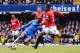 LONDON, ENGLAND - APRIL 01: Patrice Evra of Manchester United is tackled by Demba Ba of Chelsea during the FA Cup with Budweiser Sixth Round Replay match between Chelsea and Manchester United at Stamford Bridge on April 1, 2013 in London, England. (Photo by Mike Hewitt/Getty Images)