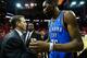 HOUSTON, TX - MAY 03: Kevin Durant #35 of the Oklahoma City Thunder greets his head coach Scott Brooks after the Thunder defeated the Houston Rockets 103-94 in Game Six of the Western Conference Quarterfinals of the 2013 NBA Playoffs at the Toyota Center on May 3, 2013 in Houston, Texas. NOTE TO USER: User expressly acknowledges and agrees that, by downloading and or using this photograph, User is consenting to the terms and conditions of the Getty Images License Agreement. (Photo by Scott Halleran/Getty Images)