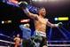 LAS VEGAS, NV - MAY 04: (R-L) Abner Mares celebrates after defeating Daniel Ponce de Leon as Jay Nady ends the fight in the ninth round in their WBC featherweight title bout at the MGM Grand Garden Arena on May 4, 2013 in Las Vegas, Nevada. (Photo by Al Bello/Getty Images)