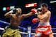 LAS VEGAS, NV - MAY 04: (L-R) Floyd Mayweather Jr. throws a left to the face of Robert Guerrero in their WBC welterweight title bout at the MGM Grand Garden Arena on May 4, 2013 in Las Vegas, Nevada. (Photo by Al Bello/Getty Images)