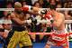 LAS VEGAS, NV - MAY 04: (L-R) Floyd Mayweather Jr. and Robert Guerrero exchange blows in their WBC welterweight title bout at the MGM Grand Garden Arena on May 4, 2013 in Las Vegas, Nevada. (Photo by Ethan Miller/Getty Images)