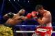 LAS VEGAS, NV - MAY 04: (L-R) Floyd Mayweather Jr. throws a left to the face of Robert Guerrero in their WBC welterweight title bout at the MGM Grand Garden Arena on May 4, 2013 in Las Vegas, Nevada. (Photo by Al Bello/Getty Images)