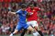 MANCHESTER, ENGLAND - MAY 05: Oscar of Chelsea tackles Anderson of Manchester United during the Barclays Premier League match between Manchester United and Chelsea at Old Trafford on May 5, 2013 in Manchester, England. (Photo by Alex Livesey/Getty Images)
