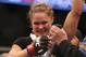ANAHEIM, CA - FEBRUARY 23: Ronda Rousey celebrates her UFC Bantamweight Title over Liz Carmouche with a member of her team during UFC 157 at Honda Center on February 23, 2013 in Anaheim, California. (Photo by Jeff Gross/Getty Images)