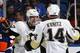 Sidney Crosby and Chris Kunitz celebrating.