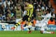 MADRID, SPAIN - APRIL 30: Robert Lewandowski of Borussia Dortmund shoots past Raphael Varane of Real Madrid during the UEFA Champions League Semi Final Second Leg match between Real Madrid and Borussia Dortmund at Estadio Santiago Bernabeu on April 30, 2013 in Madrid, Spain. (Photo by Gonzalo Arroyo Moreno/Getty Images)