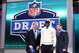 Apr 26, 2013; New York, NY, USA; (Editor's note: caption correction) NFL commissioner Roger Goodell (left) and former NFL player Wayne Chrebet (right) introduce Geno Smith (West Virginia) as the number thirty-ninth overall pick to the New York Jets during the 2013 NFL Draft at Radio City Music Hall. Mandatory Credit: Debby Wong-USA TODAY Sports