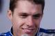 David Ragan smiles while answering questions to media at Daytona. Credit: Dwight Drum