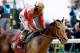 LOUISVILLE, KY - MAY 04: Joel Rosario atop Orb reacts after winning the 139th running of the Kentucky Derby at Churchill Downs on May 4, 2013 in Louisville, Kentucky. (Photo by Rob Carr/Getty Images)