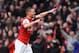 LONDON, ENGLAND - APRIL 13: Lukas Podolski of Arsenal celebrates scoring Arsenal's third goal of the match during the Barclays Premier League match between Arsenal and Norwich City at Emirates Stadium on April 13, 2013 in London, England. (Photo by Mike Hewitt/Getty Images)