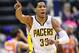 March 23, 2012; Indianapolis, IN, USA; Indiana Pacers small forward Danny Granger (33) motions to teammates against the Phoenix Suns at Bankers Life Fieldhouse. Phoenix defeated Indiana 113-111. Mandatory credit: Michael Hickey-USA TODAY Sports