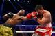 LAS VEGAS, NV - MAY 04: (L-R) Floyd Mayweather Jr. throws a left to the face of Robert Guerrero in their WBC welterweight title bout at the MGM Grand Garden Arena on May 4, 2013 in Las Vegas, Nevada. (Photo by Al Bello/Getty Images)