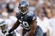 SEATTLE - SEPTEMBER 03: Arron Curry #59 of the Seattle Seahawks moves on the field during the game against the Oakland Raiders on September 3, 2009 at Qwest Field in Seattle, Washington. (Photo by Otto Greule Jr/Getty Images)