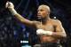 May 4, 2013; Las Vegas, NV, USA; Floyd Mayweather holds his championship belt after his WBC Welterweight title fight defeating Robert Guerrero at the MGM Grand Garden Arena. Mandatory Credit: Jayne Kamin-Oncea-USA TODAY Sports