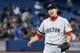 TORONTO, CANADA - MAY 2: Junichi Tazawa #36 of the Boston Red Sox gets the third out against the Toronto Blue Jays at the Rogers Cente May 2, 2013 in Toronto, Ontario, Canada. (Photo by Abelimages/Getty Images)