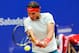 BARCELONA, SPAIN - APRIL 28: Rafael Nadal of Spain returns the ball againts Nicolas Almagro of Spain during his final match of day seven of the 2013 Barcelona Open Banc Sabadell on April 28, 2013 in Barcelona. Nadal won 6-3, 6-4. (Photo by David Ramos/Getty Images)