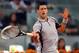 MADRID, SPAIN - MAY 07: Novak Djokovic of Serbia in action in his match against Grigor Dimitrov of Bulgaria during day four of the Mutua Madrid Open tennis tournament at the Caja Magica on May 7, 2013 in Madrid, Spain. (Photo by Julian Finney/Getty Images)