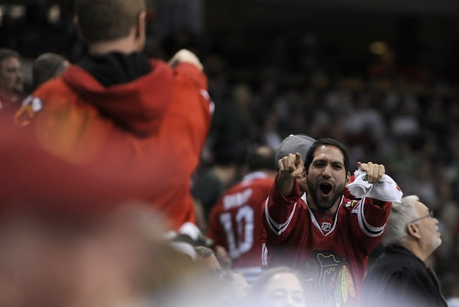 A Blackhawks' fan celebrates one of the three goals scored by Chicago. The building was utterly silent otherwise.