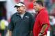 Aug 24, 2012; Tampa, FL, USA; New England Patriots head coach Bill Belichick (left) and Tampa Bay Buccaneers head coach Greg Schiano (right) during warmups at Raymond James Stadium. Mandatory Credit: Douglas Jones-USA TODAY Sports