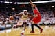 MIAMI, FL - MAY 06: LeBron James #6 of the Miami Heat drives against Jimmy Butler #21 of the Chicago Bulls during Game One of the Eastern Conference Semifinals of the 2013 NBA Playoffs at American Airlines Arena on May 6, 2013 in Miami, Florida. NOTE TO USER: User expressly acknowledges and agrees that, by downloading and/or using this photograph, user is consenting to the terms and conditions of the Getty Images License Agreement. (Photo by Chris Trotman/Getty Images)