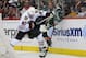 The Chicago Blackhawks prevailed in a physical battle with Minnesota in Game 4 of the team's Western Conference quarterfinal series.