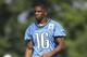ALLEN PARK, MI - AUGUST 01: Titus Young #16 of the Detroit Lions watches the morning drills unable to practice due to muscle tightness at the Lions training facility on August 1, 2011 in Allen Park, Michigan. (Photo by Leon Halip/Getty Images)