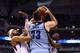 DALLAS, TX - APRIL 15: Marc Gasol #33 of the Memphis Grizzlies looks to pass against Vince Carter #25 and Darren Collison #4 of the Dallas Mavericks at American Airlines Center on April 15, 2013 in Dallas, Texas. NOTE TO USER: User expressly acknowledges and agrees that, by downloading and or using this photograph, User is consenting to the terms and conditions of the Getty Images License Agreement. (Photo by Ronald Martinez/Getty Images)