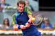 MADRID, SPAIN - MAY 07: Andy Murray of Great Britain in action against Florian Mayer of Germany during day four of the Mutua Madrid Open tennis tournament at the Caja Magica on May 7, 2013 in Madrid, Spain. (Photo by Julian Finney/Getty Images)