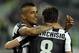 TURIN, ITALY - APRIL 21: Arturo Vidal (L) of Juventus celebrates with team-mate Claudio Marchisio after scoring their team's first goal from a penalty during the Serie A match Juventus FC v AC Milan at Juventus Arena on April 21, 2013 in Turin, Italy. (Photo by Claudio Villa/Getty Images)